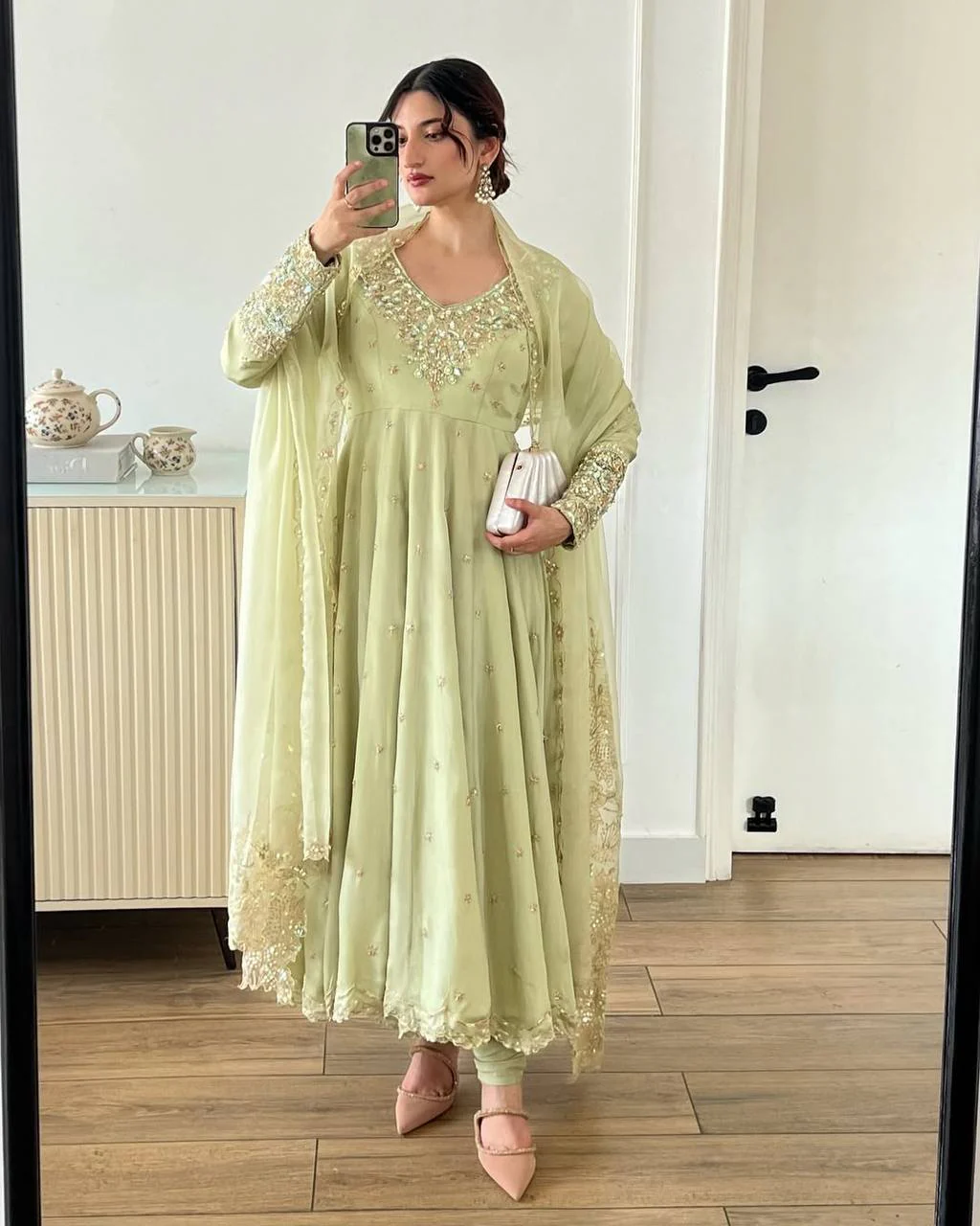 A Stylish Woman in a Green Dress - Image 6