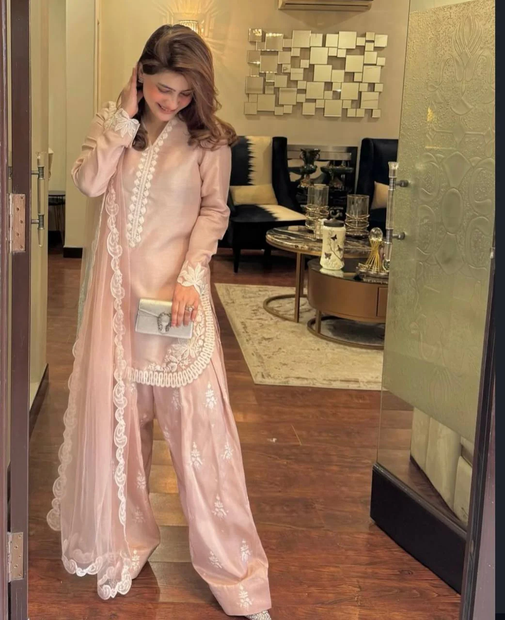 A Vision of Confidence in a Stylish Pink Suit - Image 2