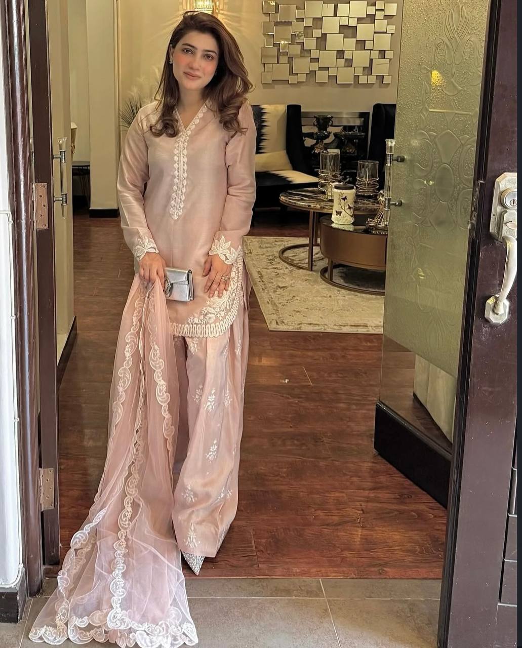 A Vision of Confidence in a Stylish Pink Suit - Image 3