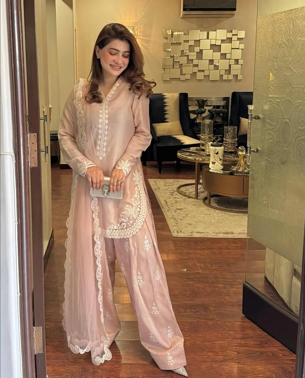 A Vision of Confidence in a Stylish Pink Suit - Image 4