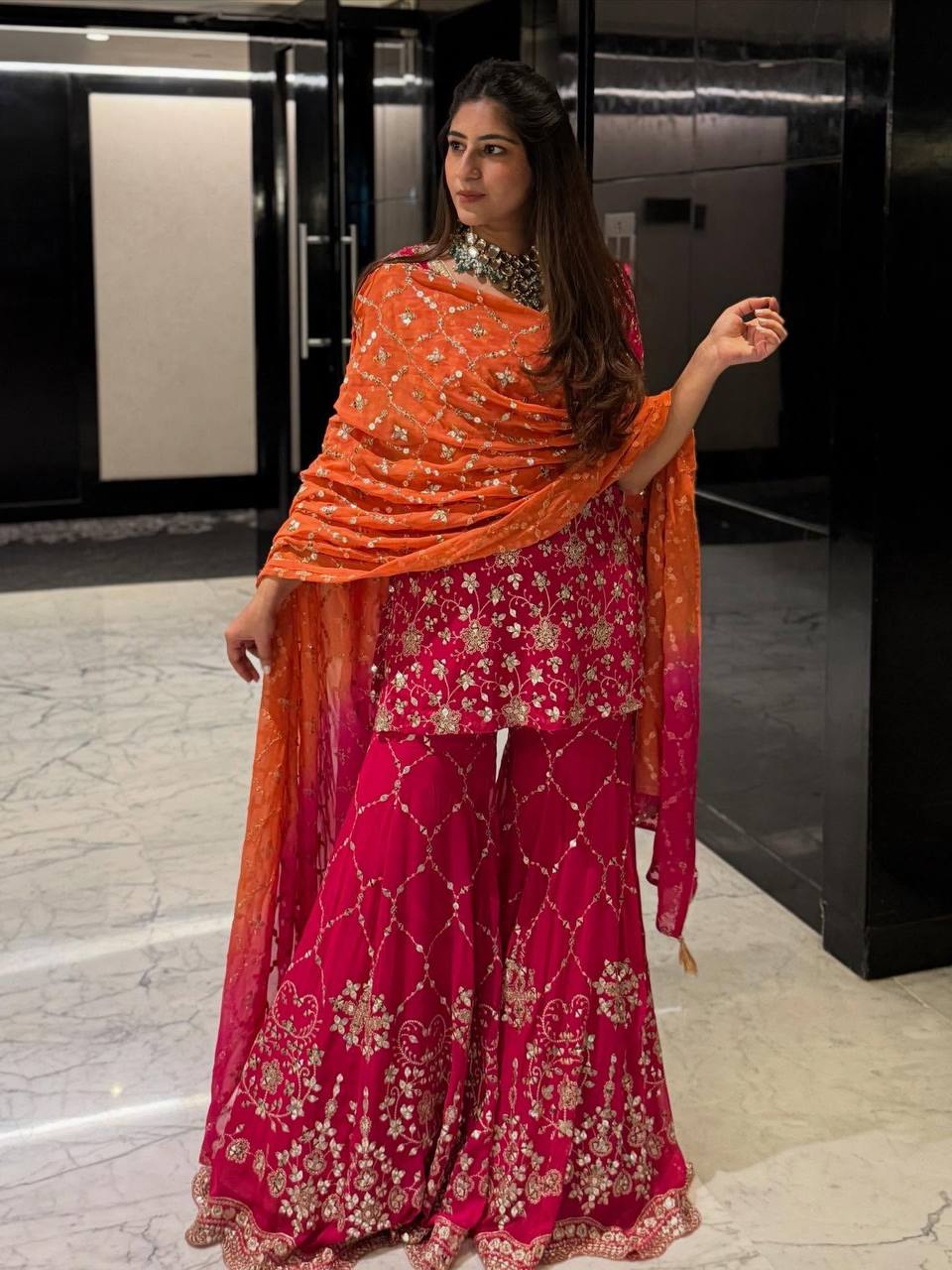 Radiant Elegance in Pink Attire - Image 3