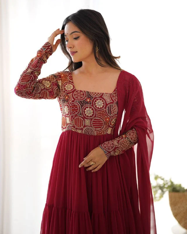 Timeless Beauty in Flowy Red Attire - Image 7